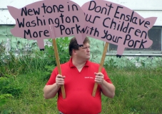 Anti-Obama protester at the discussion sponsored by Joe Donnelly.