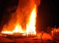 Fires started by members of the ELF consume a building under construction in San Diego.