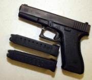 A Glock 9mm pistol similar to the one carried by Timothy McVeigh, with two ammunition clips.