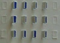 An example of a ballot with so-called ‘hanging chads,’ ‘chads’ punched partially through the ballot but still ‘hanging’ on to the back of the ballot. Punch-card voting machines often do not read these as votes.