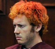 Accused Aurora gunman James Holmes looks on during a recent court hearing regarding his alleged crimes. At some point, Holmes dyed his hair, allegedly to more closely resemble ‘The Joker,’ a villain in the Batman movies.