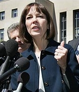 Judith Miller speaks to reporters outside the courtroom.