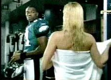 A still from the advertisement featuring Terrell Owens and Nicollete Sheridan.
