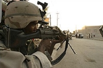 A scene of a US soldier aiming his weapon from the ‘Ramadi Madness’ videotapes.