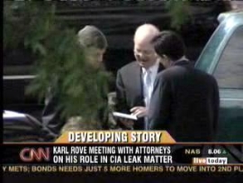 Karl Rove discusses his testimony with his lawyers outside the grand jury chambers.