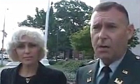 Lawyer Orly Taitz (left) and Army Reserve Major Stefan Cook, during an interview for a television news crew.
