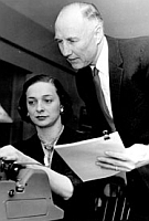 Senator Strom Thurmond (right) supervises the typing of an early draft of the document that will come to be known as the ‘Southern Manifesto.’