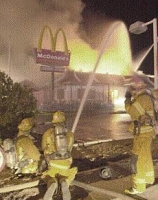 Firefighters battle a blaze at a Tucson McDonald’s restaurant.