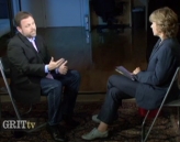 Tim Wise (L) and Laura Flanders during their interview.