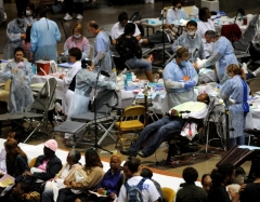 Hundreds wait in line for dental care at the Remote Area Medical clinic at The Forum.