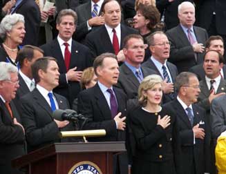 Members of Congress gathered on the steps of the Capitol.