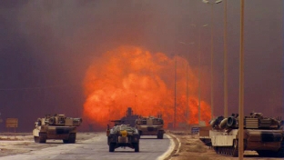 A roadside bomb detonates on an Iraqi highway.